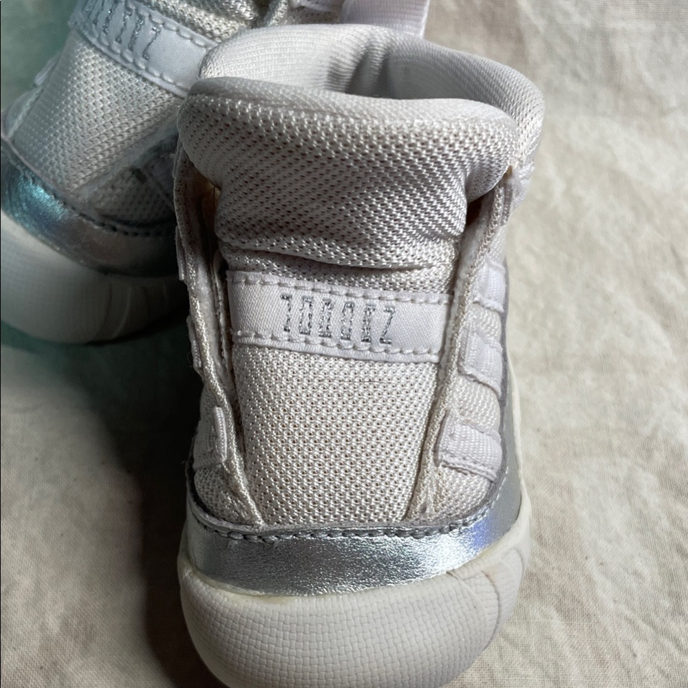 Gently loved pair of Retro Jordan 11 crib booties baby walker shoes size 2C